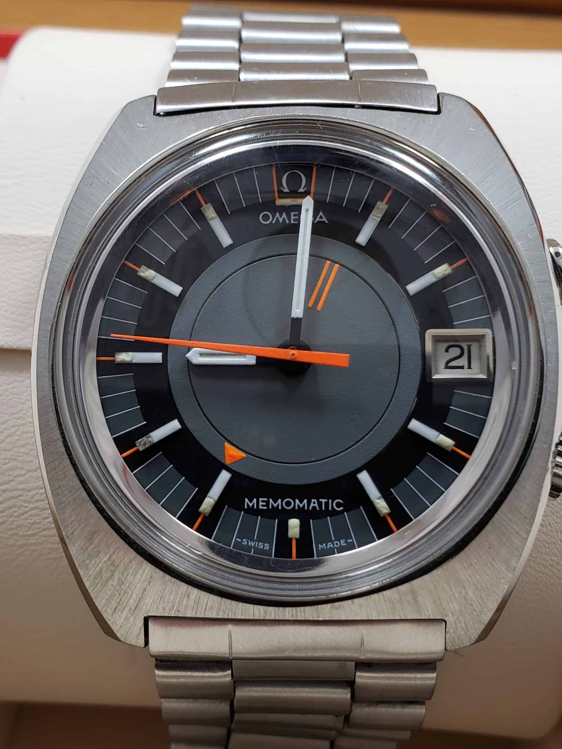 Vintage Omega Memomatic with brushed steel case, grey dial and orange seconds hand