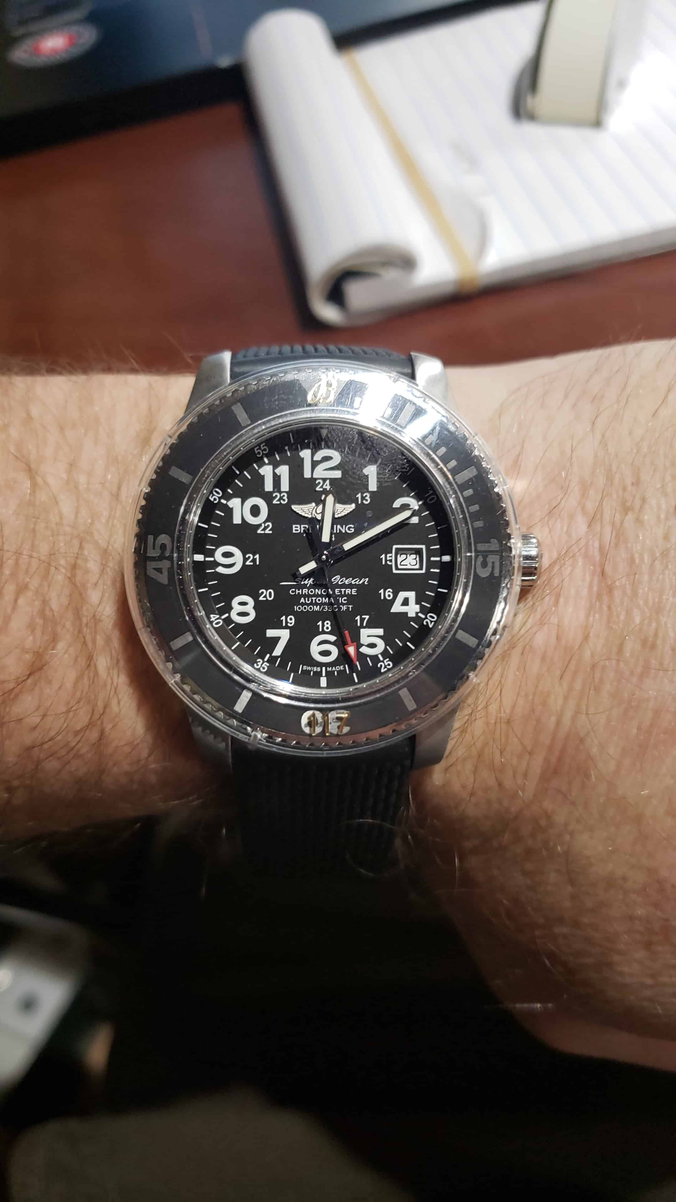Breitling Superocean automatic dive watch with black dial and rubber strap