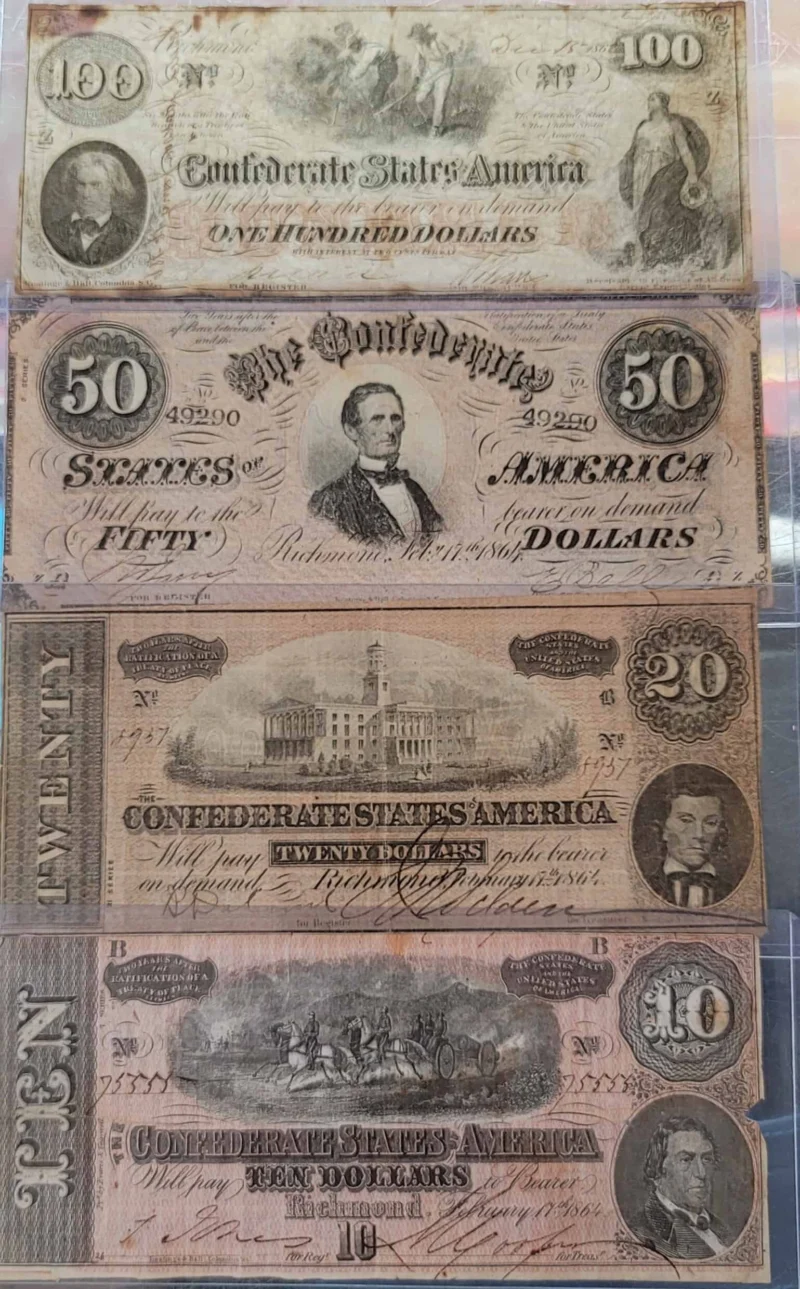 Confederate States $100, $50, $20 and $10 notes in a holder