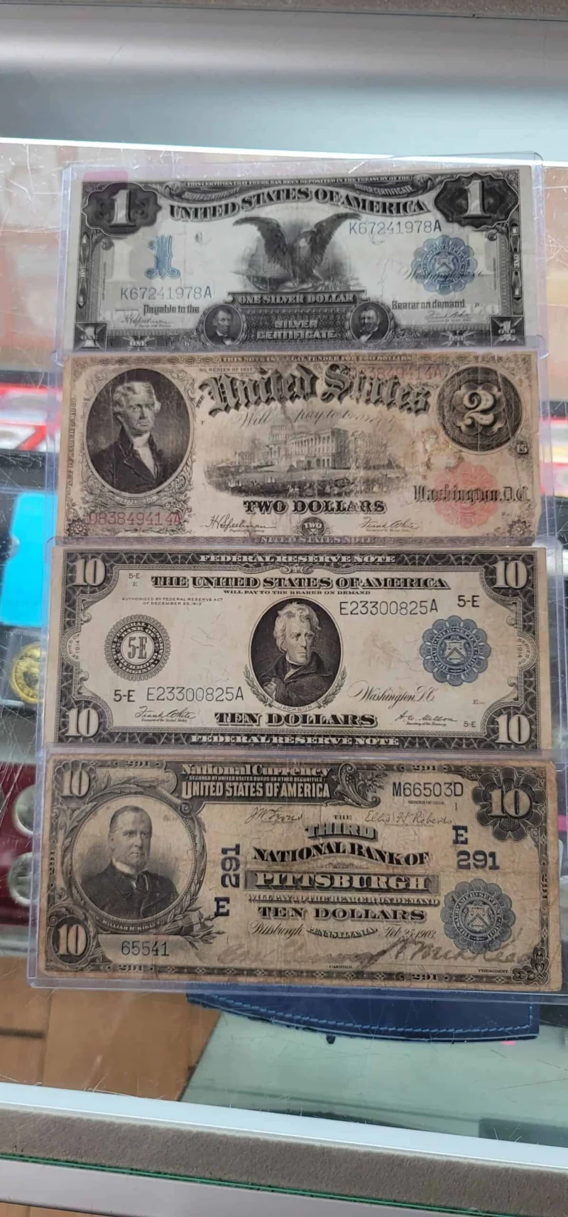 Vintage US notes including an 1899 $1 Black Eagle and 1917 $2 note
