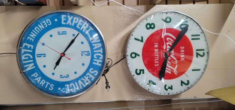 Vintage Elgin and Coca-Cola advertising wall clocks