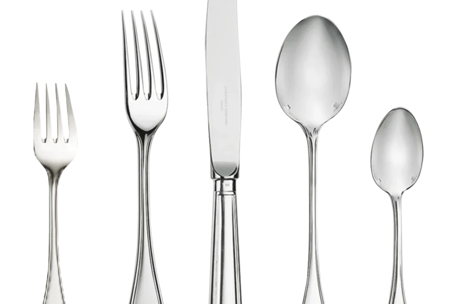 Sterling silver flatware and serving pieces on the counter at Apex Gold Silver Coin in Winston-Salem