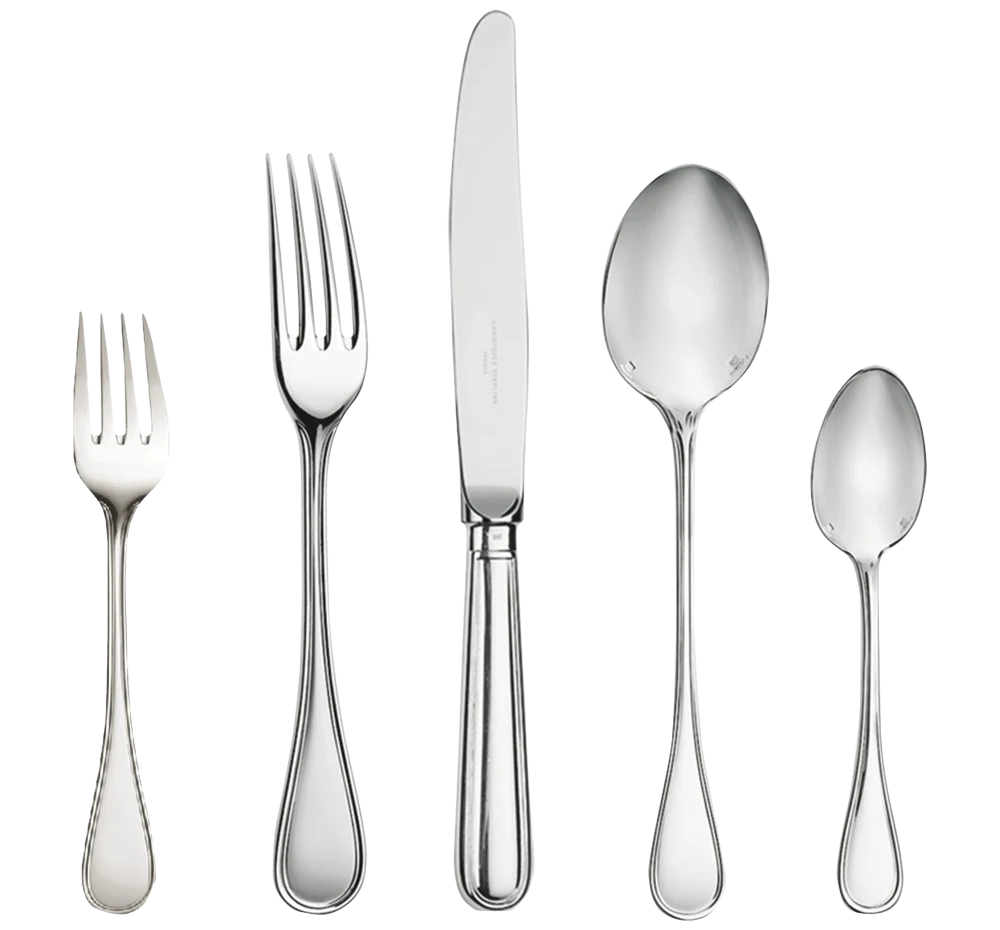 Sterling silver flatware and serving pieces on the counter at Apex Gold Silver Coin in Winston-Salem