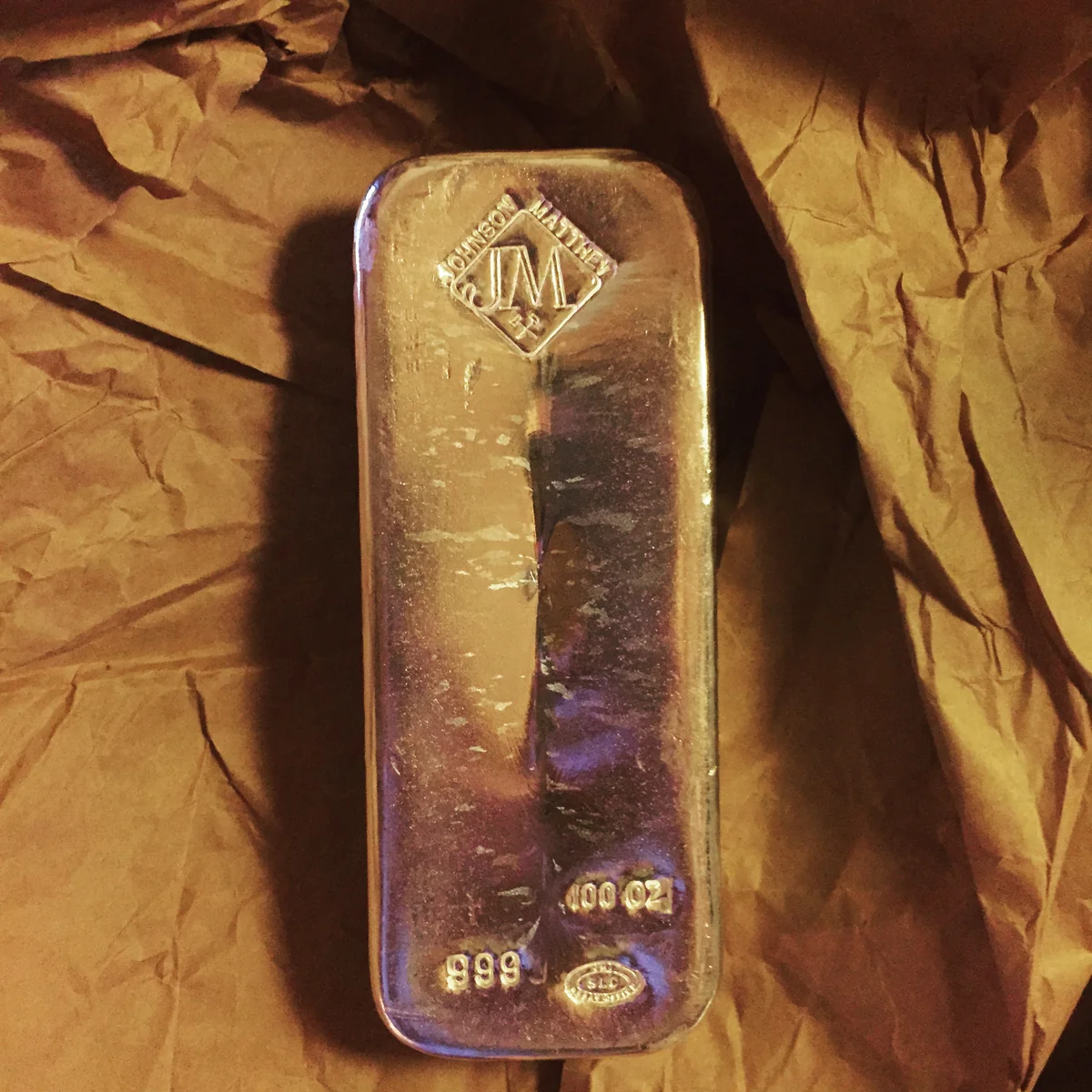 Silver bars and rounds on a scale, Apex Gold Silver Coin Winston-Salem